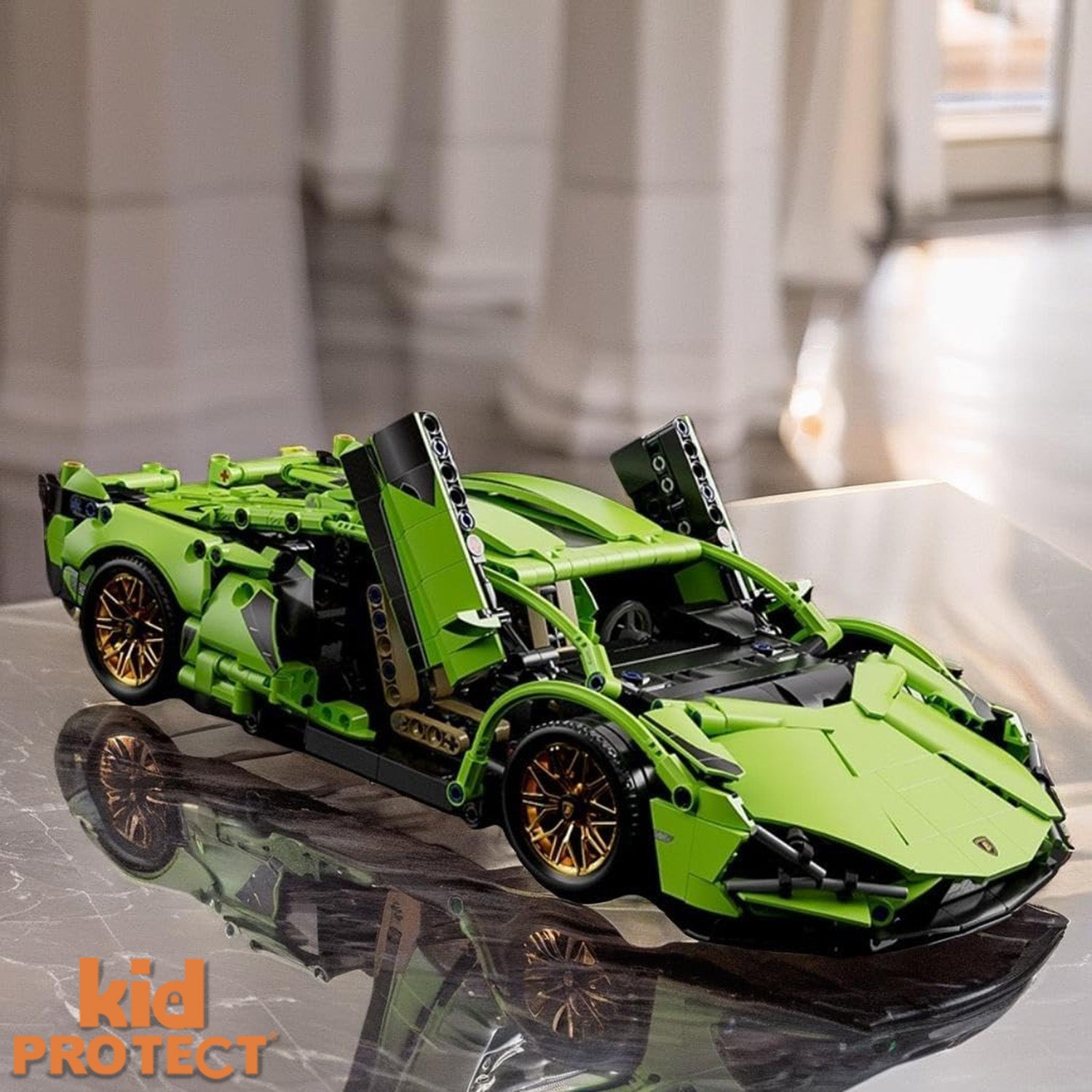 Green toy car model on a reflective surface with 'kidPROTECT' branding.